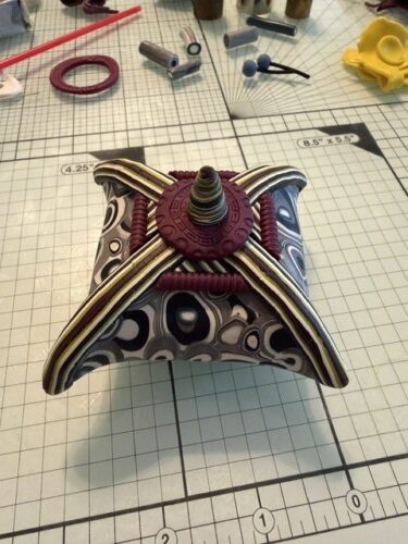 Cane-covered puff box with a stacked finial by Linda Hess