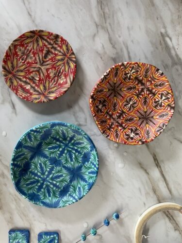 Kaleidoscope cane trinket dishes made by students in Lynne Sole's class